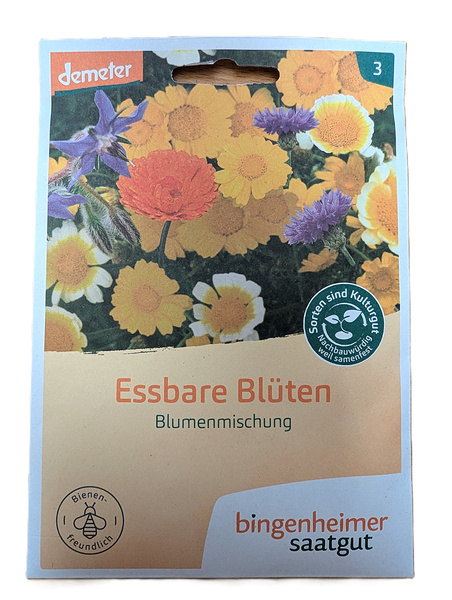 KI generiert: Saatguttüte für "Essbare Blüten" mit bunten Blumenbildern. Text: "Essbare Blüten Blumenmischung".